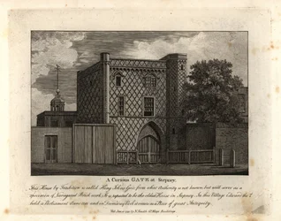 Une porte curieuse en briques variées appelée St John Gate, la plus ancienne maison de Stepney