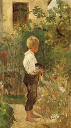 Garçon avec chat dans le jardin