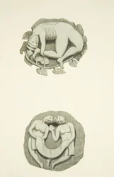 Deux pierres de voûte au plafond en entrant par la porte nord de la Cathédrale de Bristol