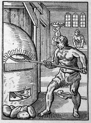 Un boulanger cuisant du pain dans un four. Gravure de Jost Amman. 16ème siècle