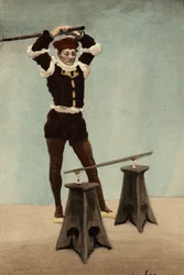 Eusthène frappant le bâton suspendu à deux verres posés par Panurge. Pantagruel. Illustration de Jules Garnier. Dans "Rabelais et l
