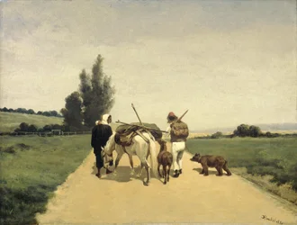 Famille en voyage sur une route de campagne