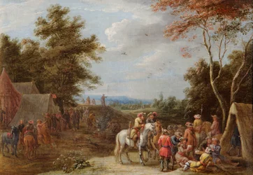 Un campement avec des soldats jouant aux cartes