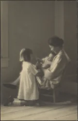 [Mère dans un fauteuil à bascule avec ses enfants]