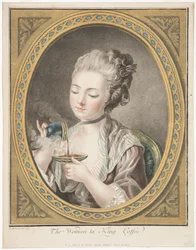 La femme prenant du café