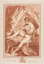 Jeune femme assise sur un lit