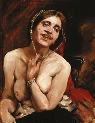 Nu féminin dans le fauteuil