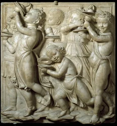 Panneau de la Cantoria : enfant jouant des cymbales. Haut-relief en marbre par Luca della Robbia 1431-1438