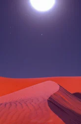 Flamboiements sur les dunes de sable du désert à minuit près du champ de pétrole et de gaz naturel de Lekhwair