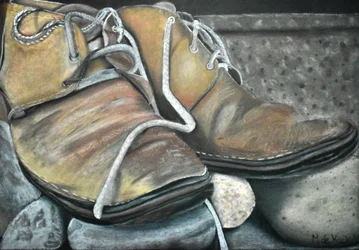 De vieilles bottes sur les rochers