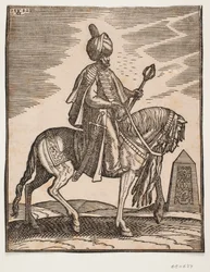 Cavalier en turban avec une épée à sa droite et une massue de guerre dans sa main gauche, profil vers la droite; en arrière-plan, un obélisque