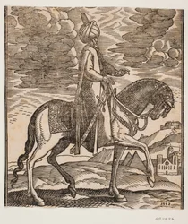Cavalier en turban, avec une épée à son côté droit, profil vers la droite ; entre les pattes avant du cheval, deux pyramides apparaissent