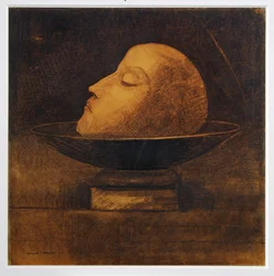 Tête de martyr dans une coupe (fusain et craie sur papier)
