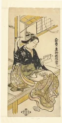 Femme avec miroir à main