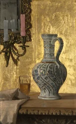 Pichet et un verre sur une table