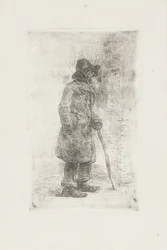 Homme debout avec une pipe