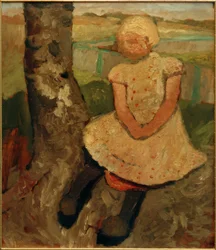 Enfant assis sous un arbre