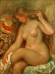 Baigneuse avec jambes croisées et chapeau