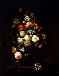 Nature morte avec des fleurs dans un vase en verre