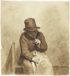 Homme assis fumant