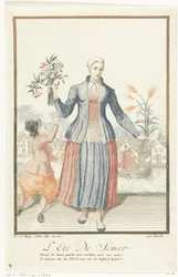Jeune femme avec des fruits et des épis de blé