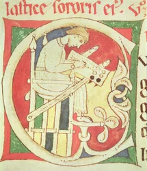 Initiale historiée C représentant un moine écrivant, des Vitae Sanctorum, Santa Cruz de Coimbra
