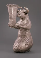 Taureau agenouillé tenant un vase à bec, c.3000 BC