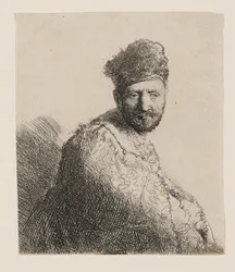 Homme barbu portant un bonnet oriental bordé de fourrure et une robe : portrait en demi-longueur