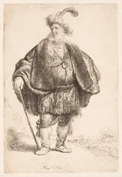 Homme debout, vêtu d