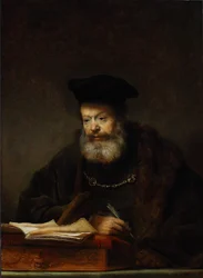 Érudit à sa table d