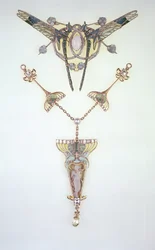 Ornement de cheveux par Lalique et pendentif par Philippe Wolfers