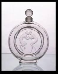 Le Baiser du Faune, flacon de parfum en verre transparent pour Molinard par Lalique