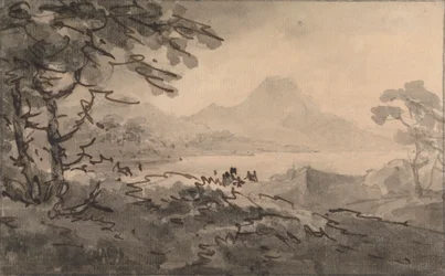 Un lac avec des montagnes au loin
