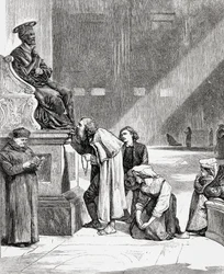 Personnes embrassant les pieds de la statue de Saint Pierre à l