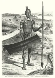 Guerrier Shuli entièrement équipé; village en arrière-plan (gravure)