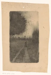 Femme sur un chemin de campagne