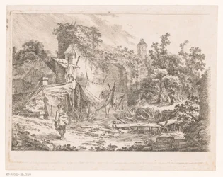 Paysage avec cabane et filets de pêche sur des piquets