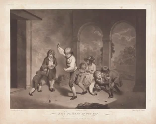 Garçons jouant au toupie