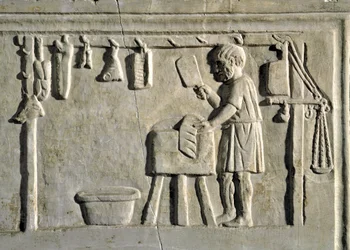 Un boucher dans son échoppe. Bas-relief, civilisation romaine, 2e siècle ap. J.-C., Rome, Museo della Civilta Romana
