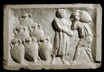 Art romain : « chargement et arrimage des amphores à vin ». Bas-relief. 2ème siècle après J.-C. Rome, Musée de la civilisation romaine