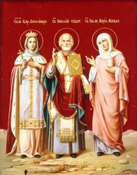Une icône peinte sur verre représentant Saint Nicolas, Sainte Alexandra et Marie-Madeleine