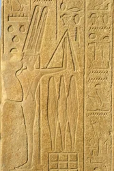 Égypte ancienne, peinture murale/sculpture, le dieu Min, temple de Karnak, Louxor, dieu de la fertilité, tenant un fléau (photo)