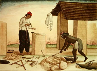 Travailleurs construisant une maison