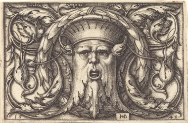 Ornement avec un masque