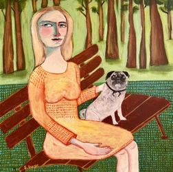 Une femme avec un carlin