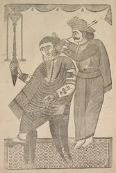 Un barbier nettoyant l