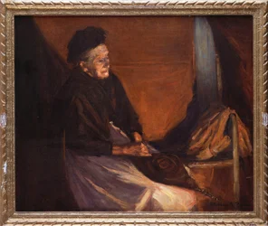 Vieille femme avec soufflet près d