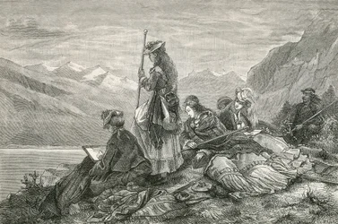 Touristes se reposant dans les Alpes