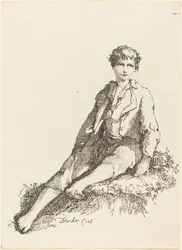 Jeune garçon assis