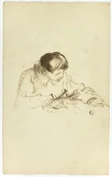 Garçon écrivant ou dessinant